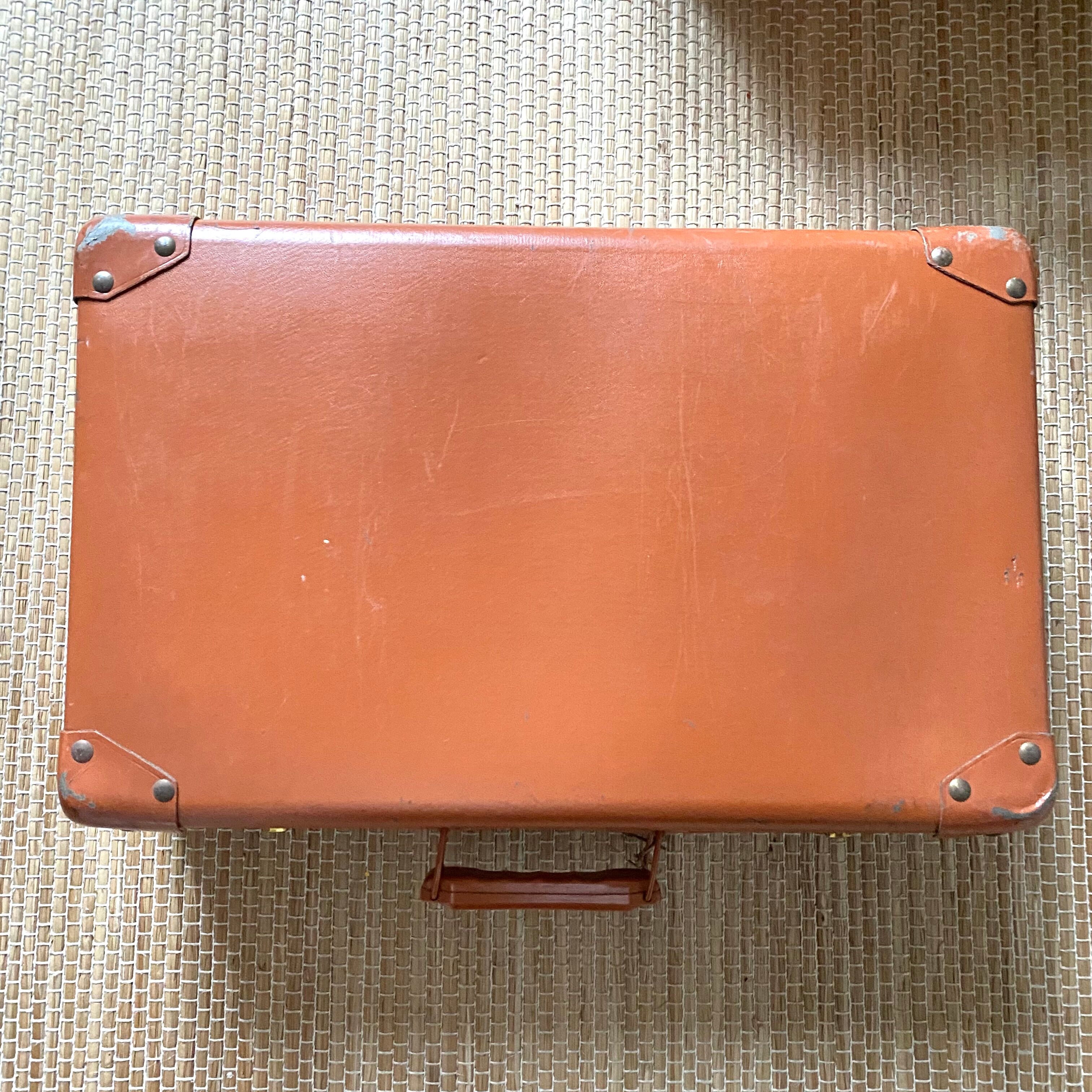 Antique suitcase and its key