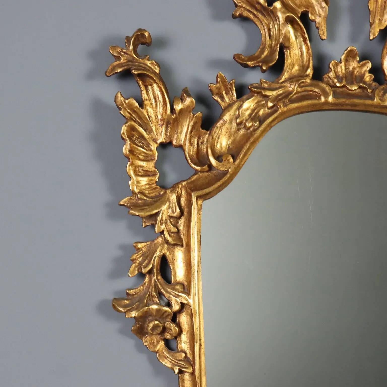 Antique carved and gilded wooden mirror, Italy, late 19th century.
