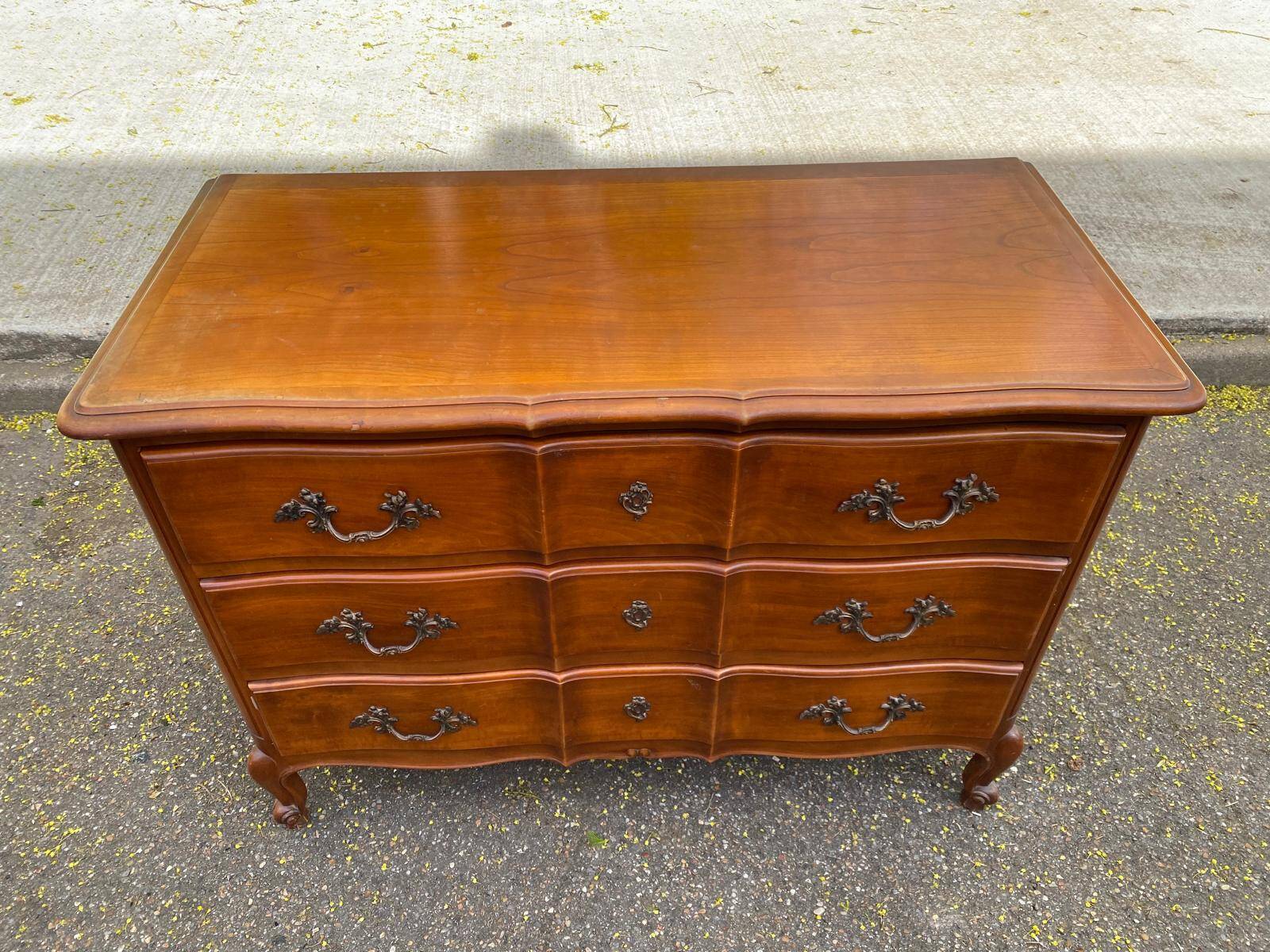 Louis XV crossbow commode in solid cherry wood from the 20th century.