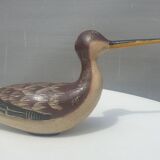 Carved painted wooden curlew