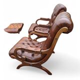 Pair of leather Chesterfields and footstools