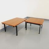 Suite of two vintage modernist Isa coffee tables in teak and black metal from the 60s