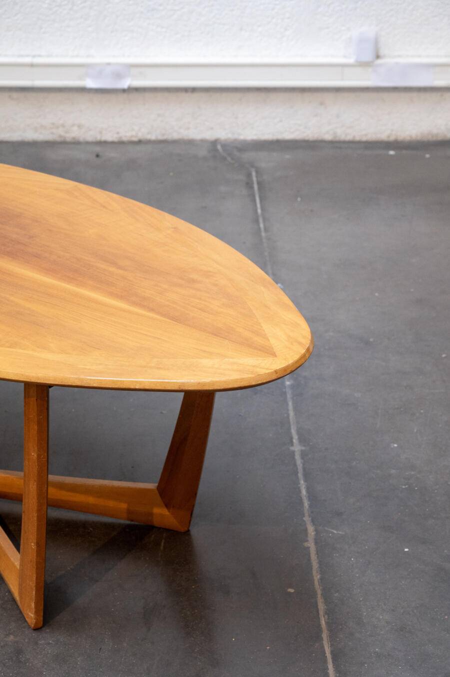 Oval teak coffee table