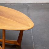 Oval teak coffee table