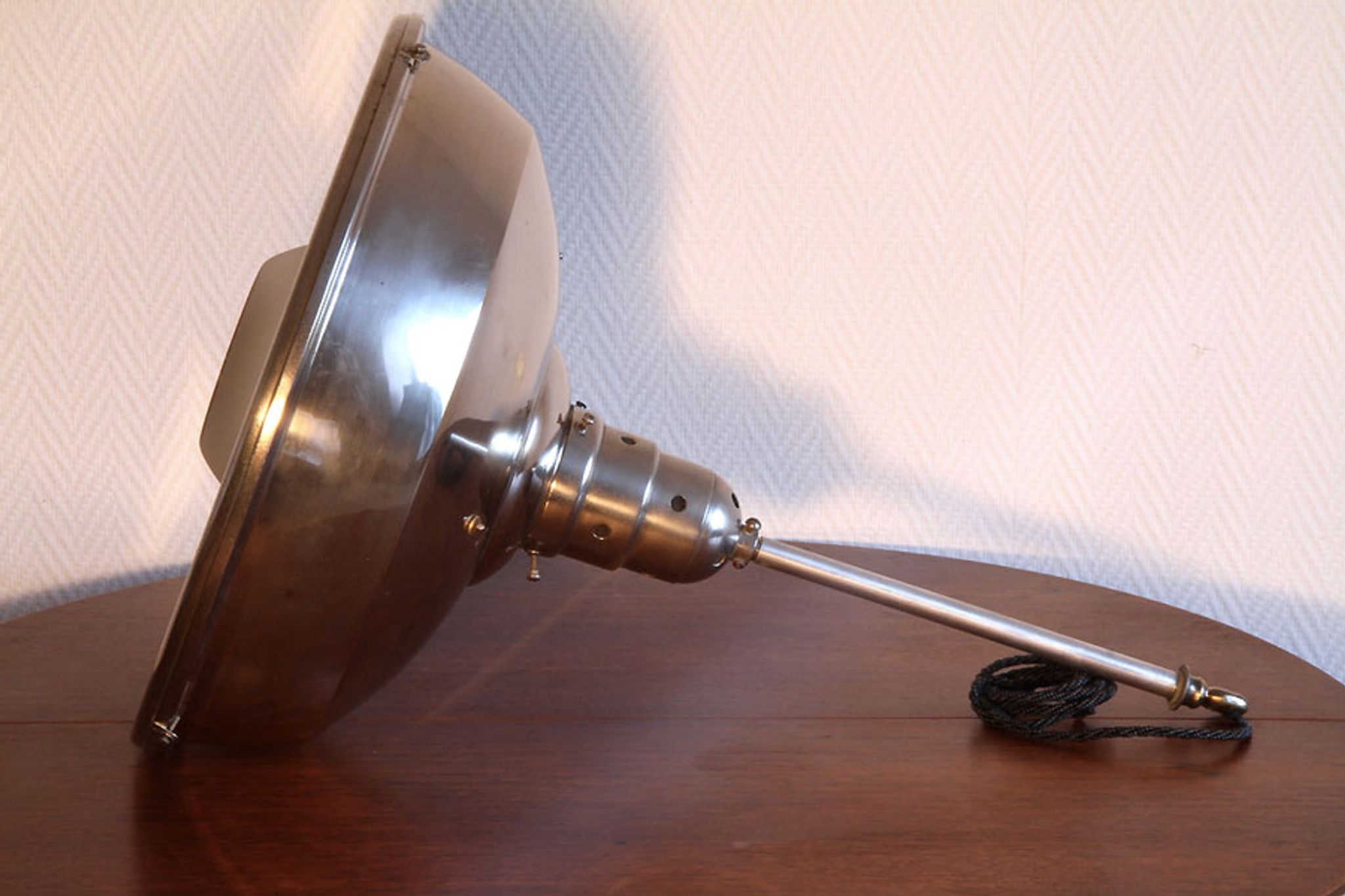 Old Bauhaus lamp in mercurized glass chrome industrial suspension.