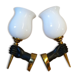 Pair of sconces in hands of Nubian by John Dévoluy