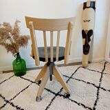 Black and wood workshop chair with metal base