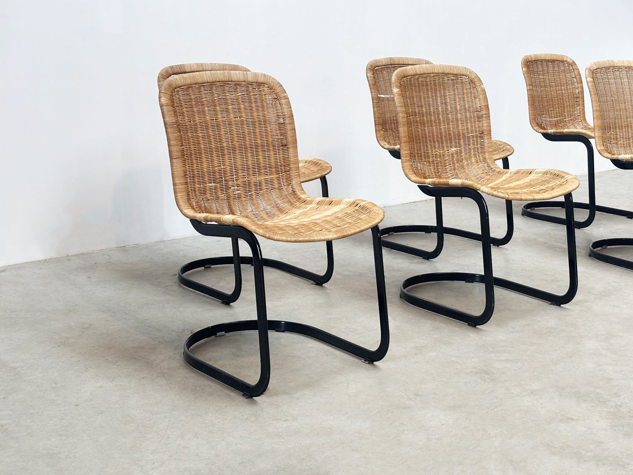 Set of six Cidue rattan dining chairs
