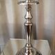 Pair of candle holders in sober and elegant silver metal