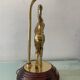 Vintage Peris Andreu lamp in bronze and wood from the 1970s.