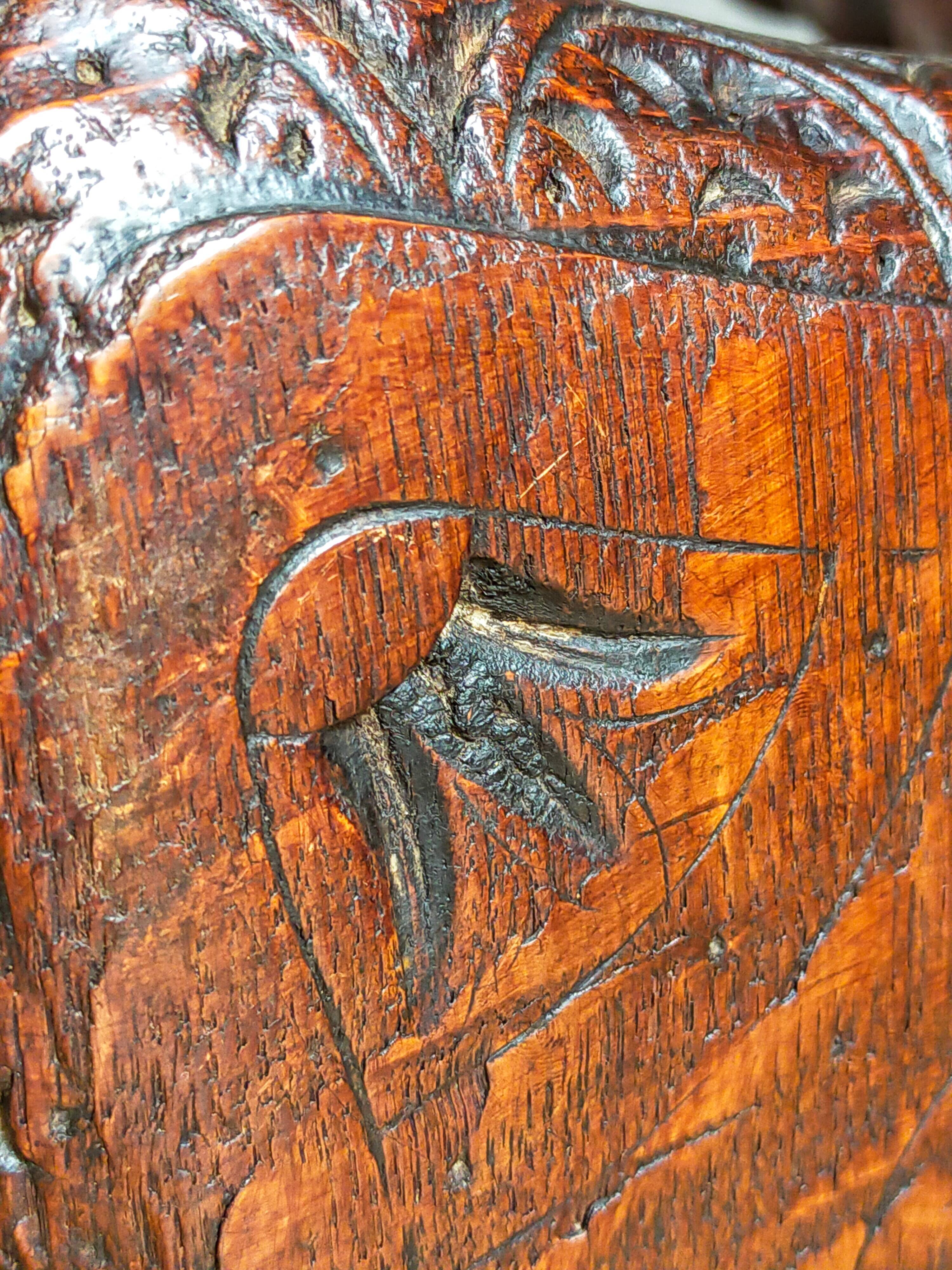 Antique stool in turned and carved solid wood
