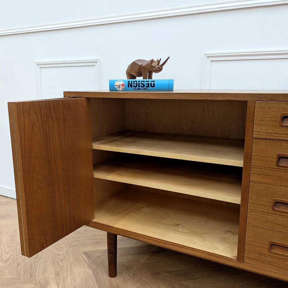 Small vintage Scandinavian teak sideboard.