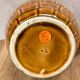 Vintage Sarreguemines pitcher with brown relief decoration.