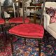 Set of four Napoleon III chairs in black lacquered wood with gold highlights.