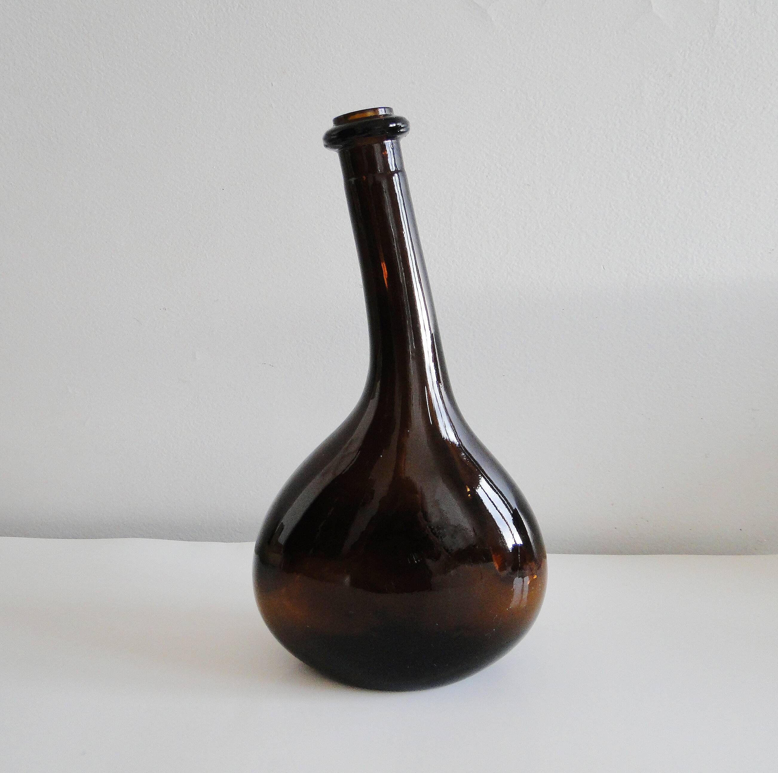 Old and original blown glass bottle with XXth bent neck
