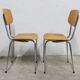 Pair of mustard-colored 70s welded Skai chairs