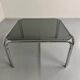 Space coffee table from the 70s, tubular metal and vintage smoked glass