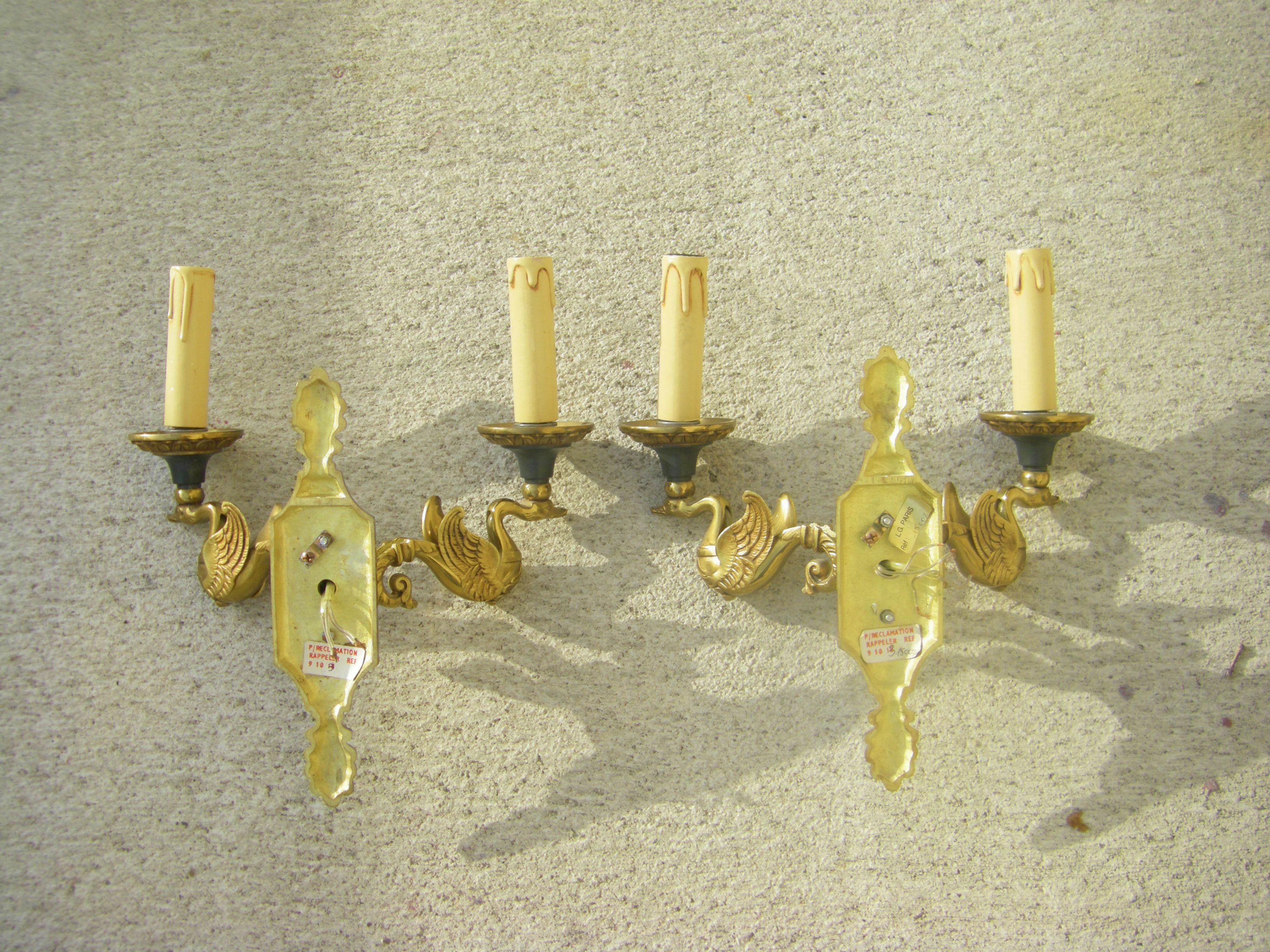 Pair of “Aux Cygnes” wall lights by Lucien Gau in Paris