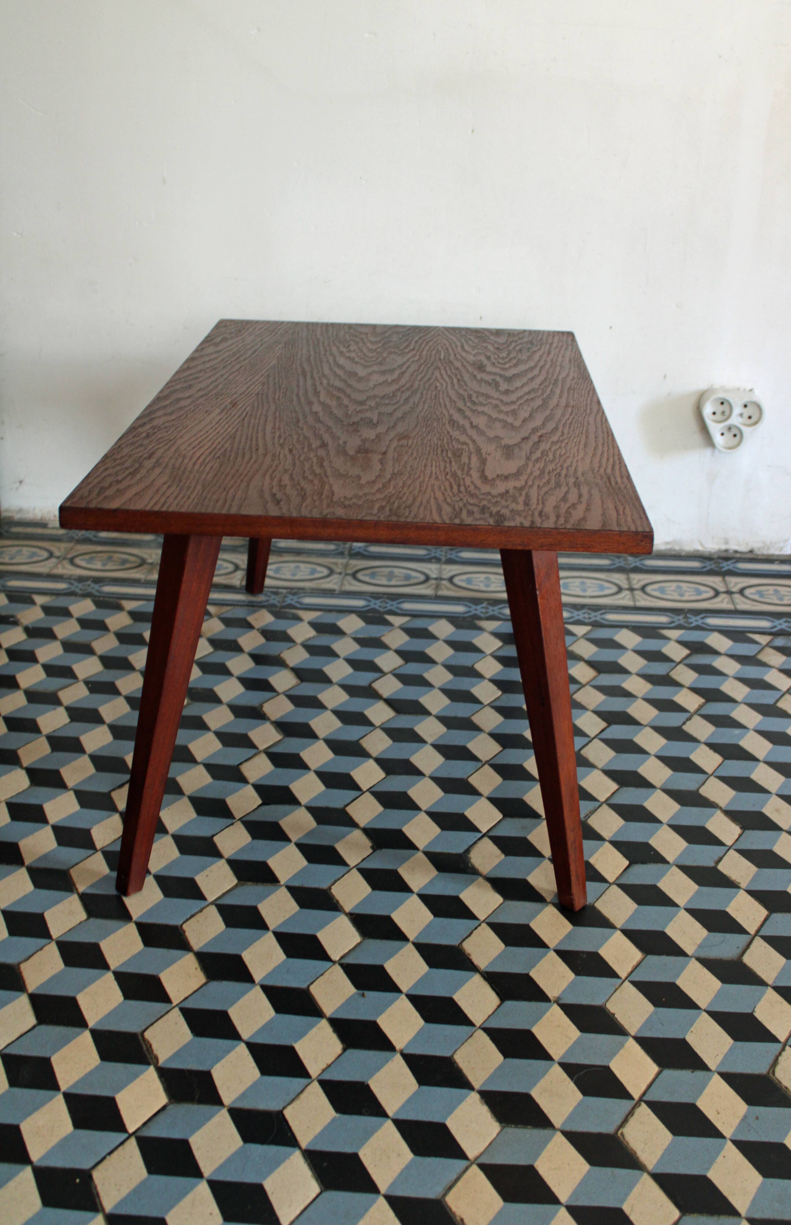 Teak coffee table with compass feet