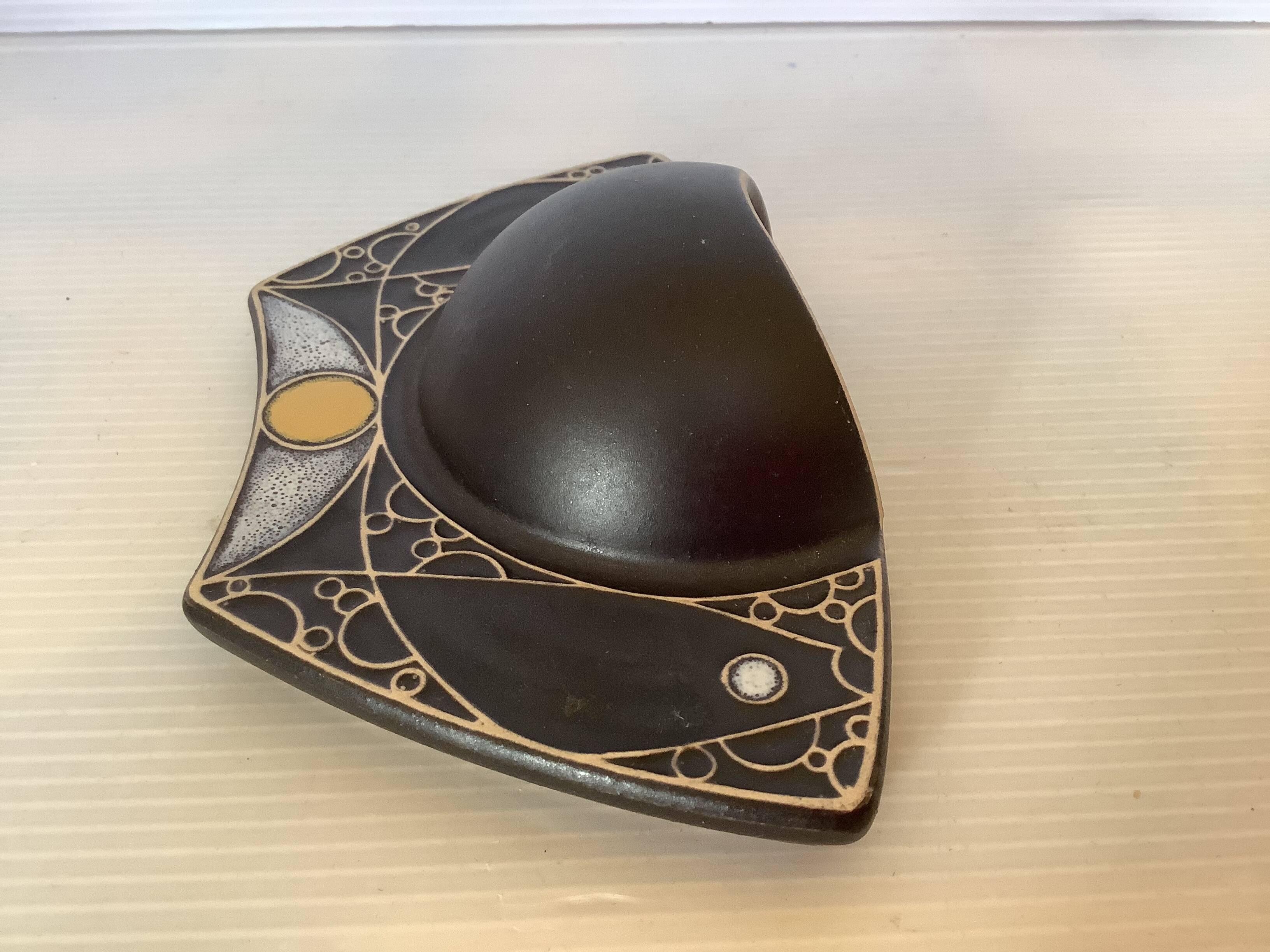 Asymmetrical black flower vase