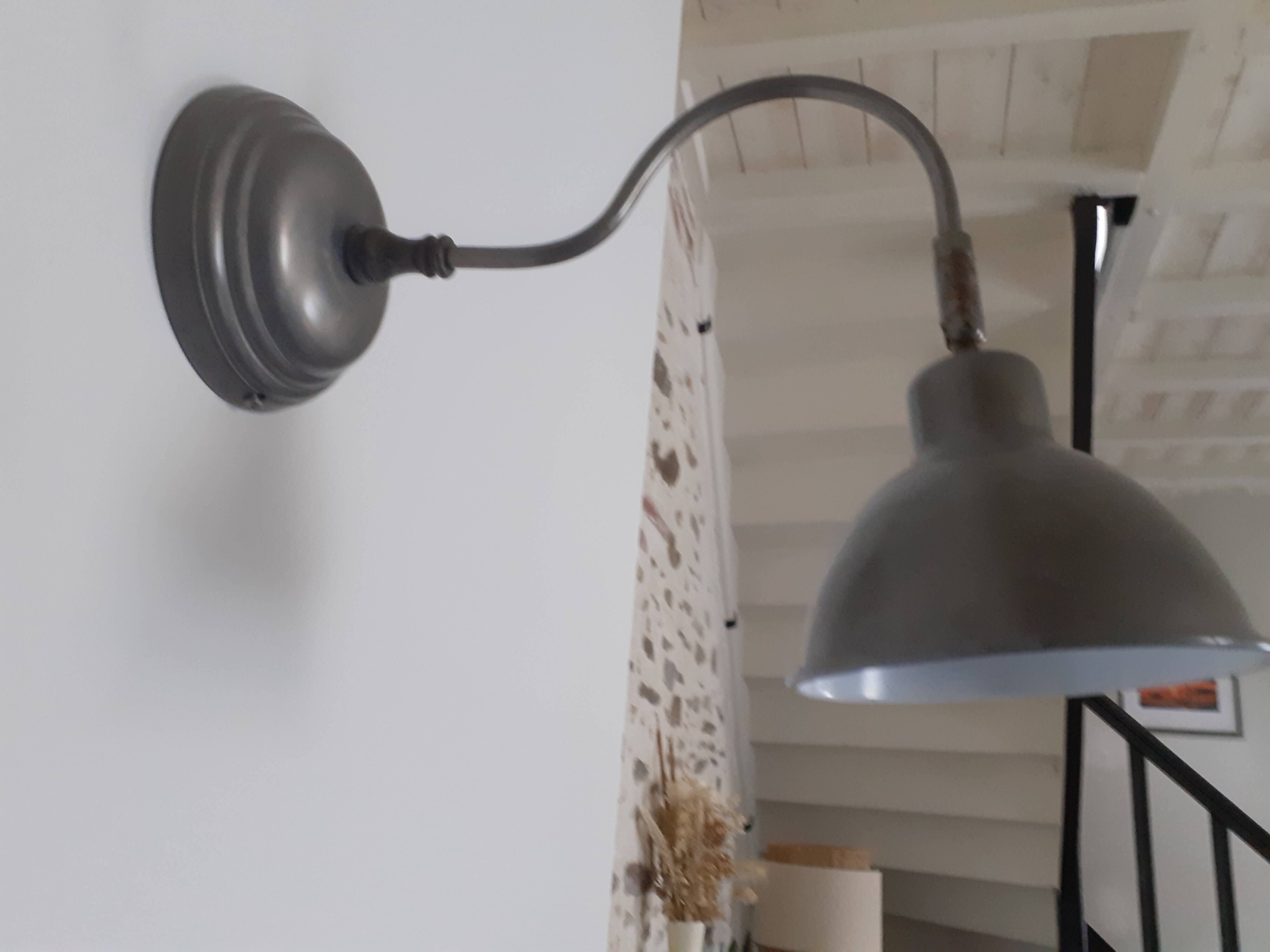 Metal wall lamp in industrial style