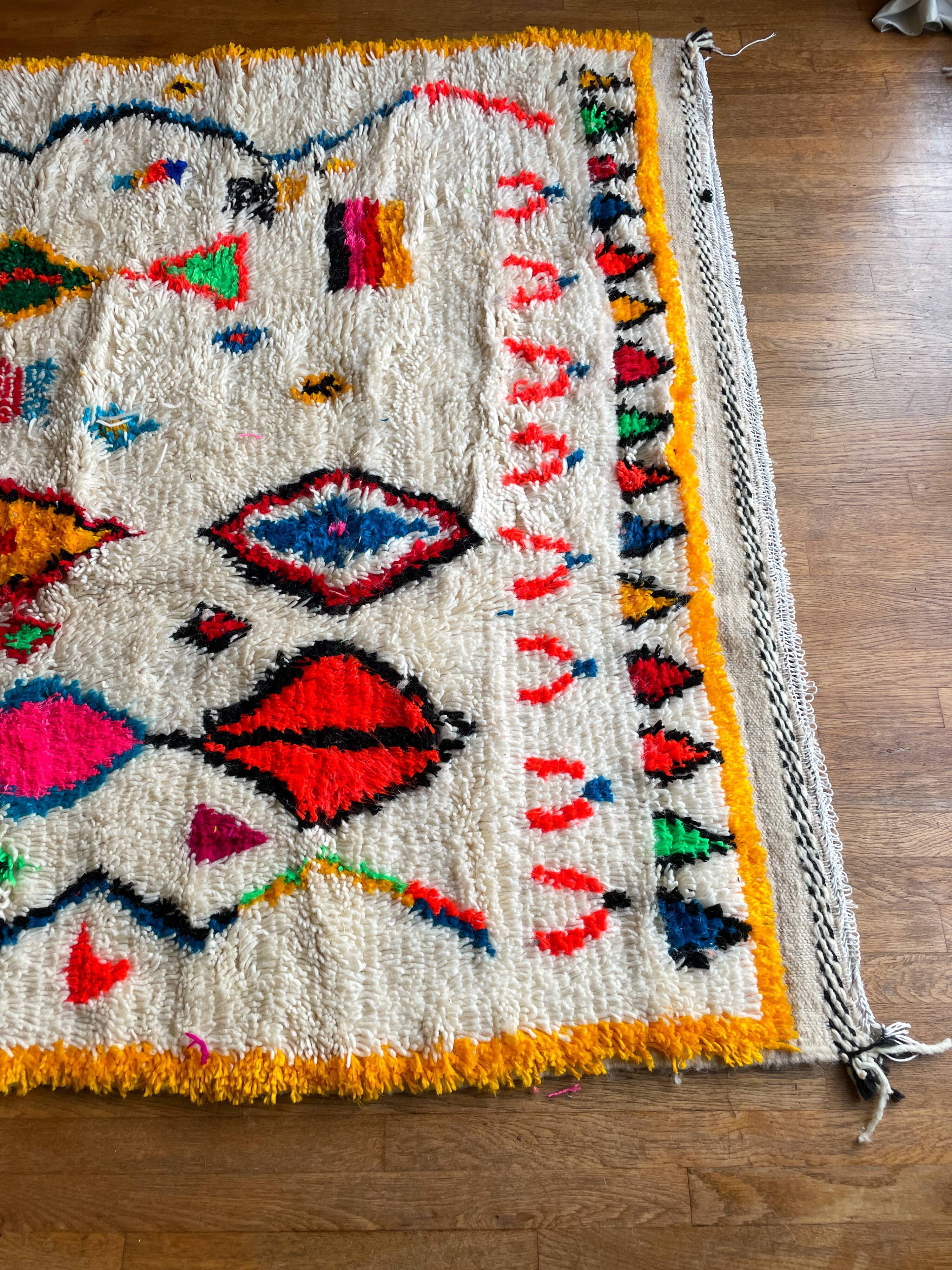 Berber carpet azimuth colored white with multicolored and fluorescent patterns