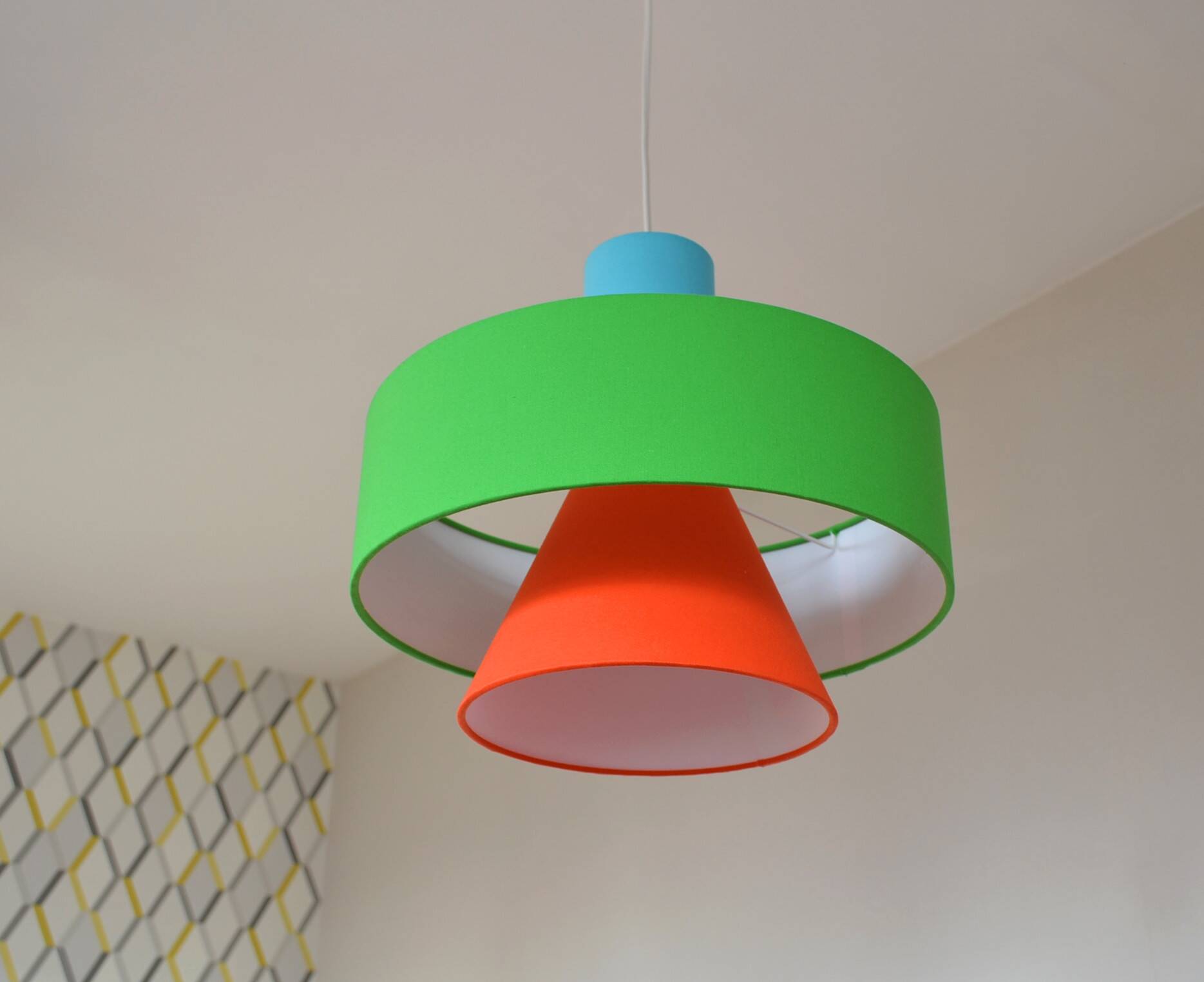 Gravity pendant lamp - sleek design in coloured fabric