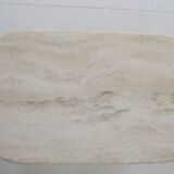 Oval travertine coffee table
