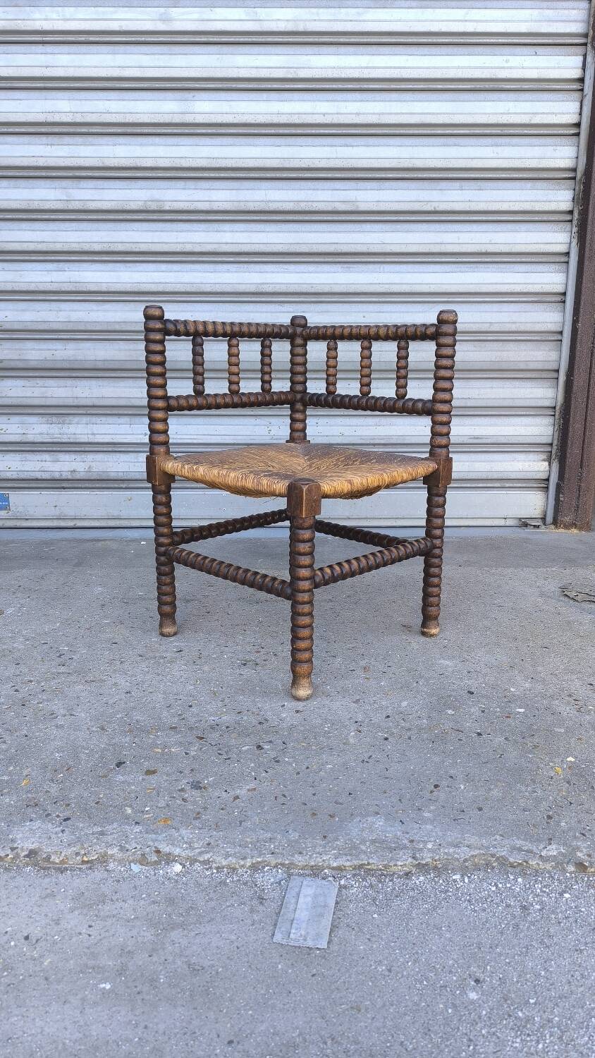 Fauteuil coin du feu en bois tourné début xx ème