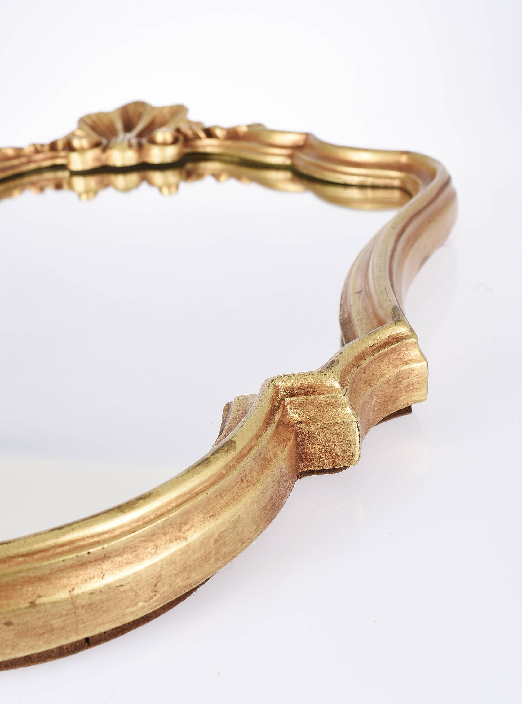 Large old mirror, golden shell, height 70 cm