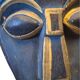 Masque africain en bois sculpté bleu et doré, oreilles de lion