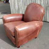 Club chair in brown leather