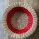 Rattan basket with red trim