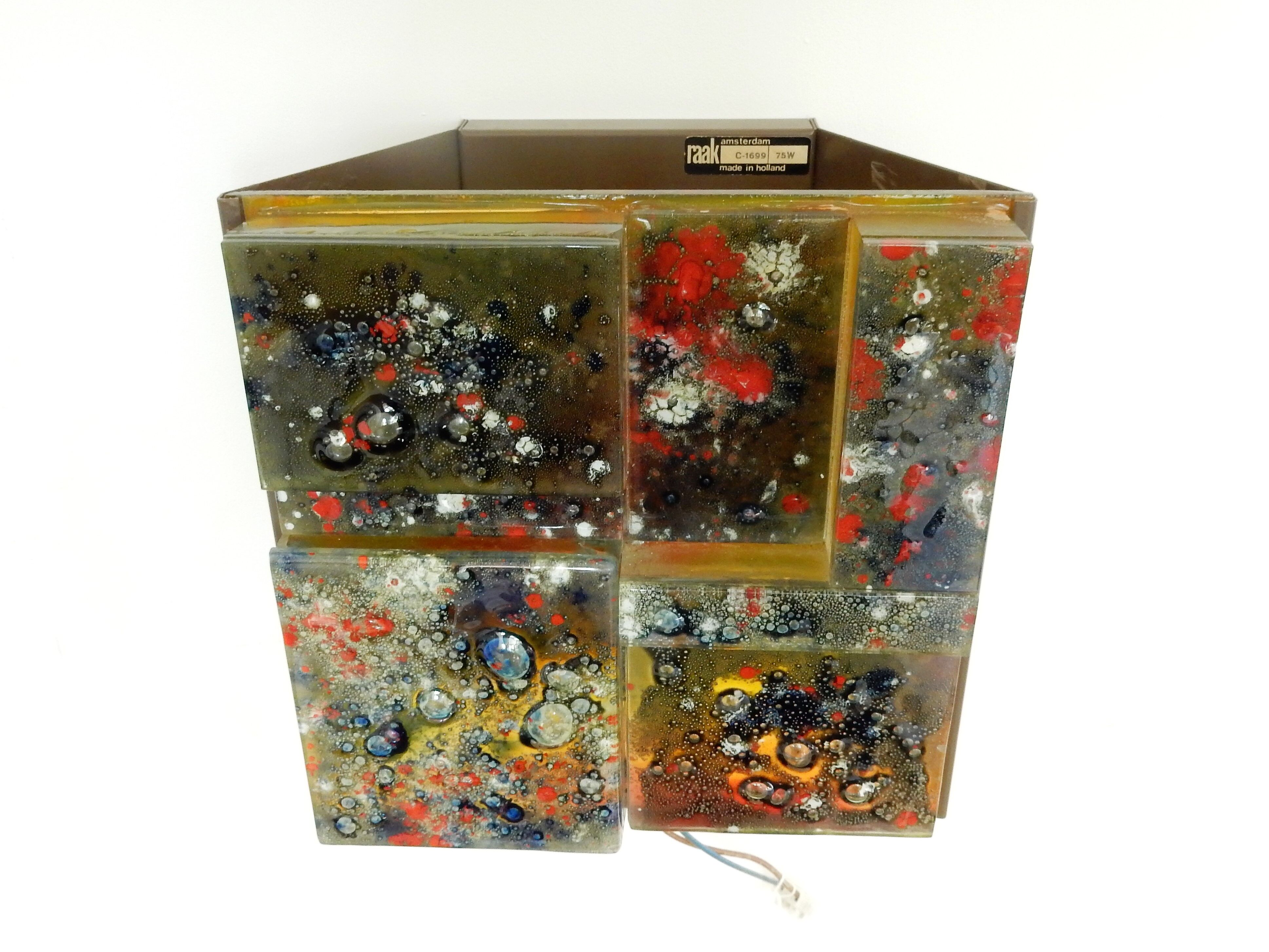 Style-relief wall sconce from Raak, 1960s