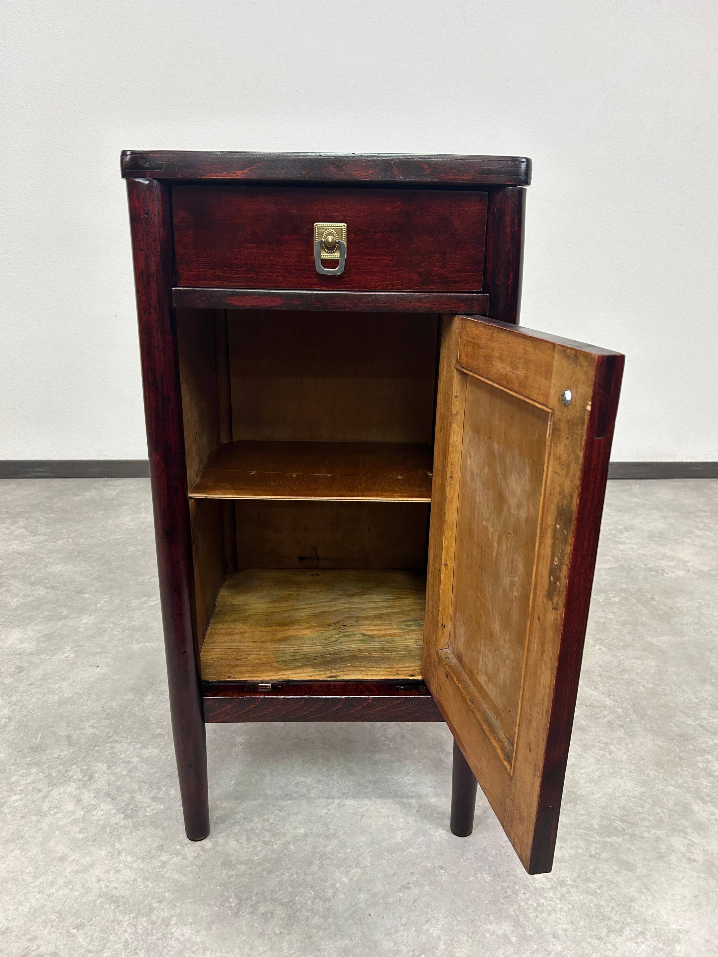Secession bedside table by J&J Kohn