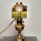 Brass lamp "La Parisienne" at the end of the 19th century.