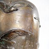 Large Art Deco vase in patinated brass, relief decoration of birds – year