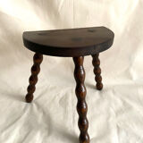 Tripod stool in turned wood