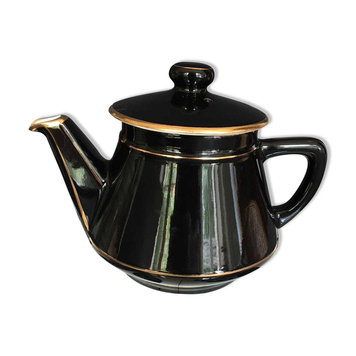 Black and gold ceramic coffee maker