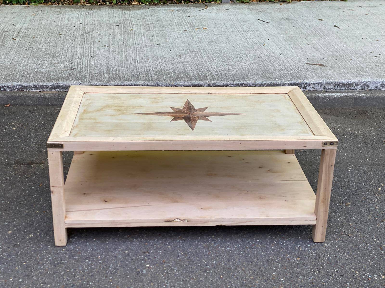 Renovated solid wood coffee table in chic country seaside style.