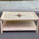 Renovated solid wood coffee table in chic country seaside style.
