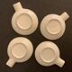 4 individual Italian ceramic stackable ashtrays with women's faces