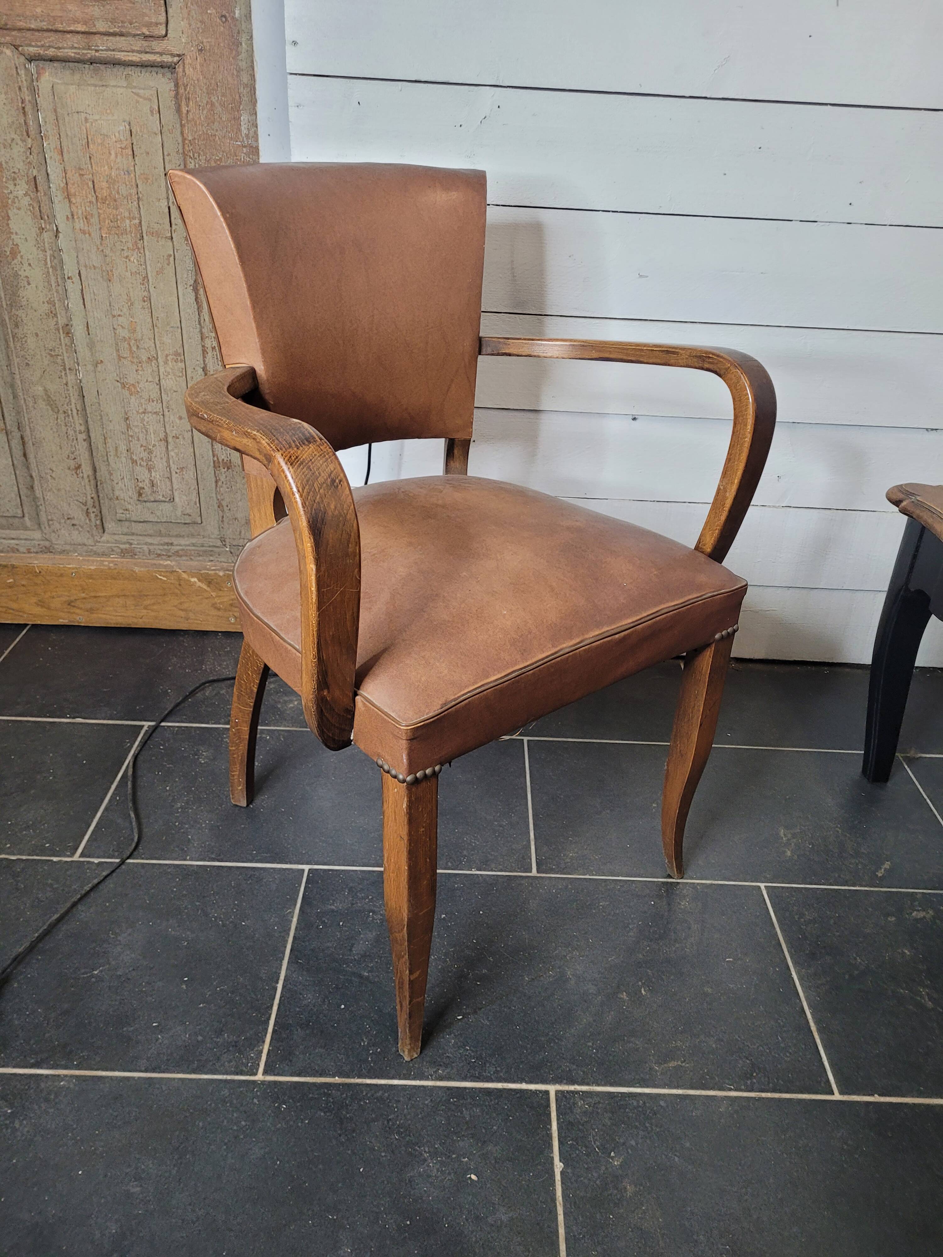 Bridge armchair in skai from the 60s
