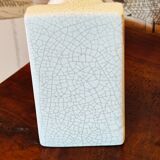 Pair of greenhouse art-deco books about cracked earthenware bird