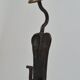 Pair of handforged metal and brass andirons