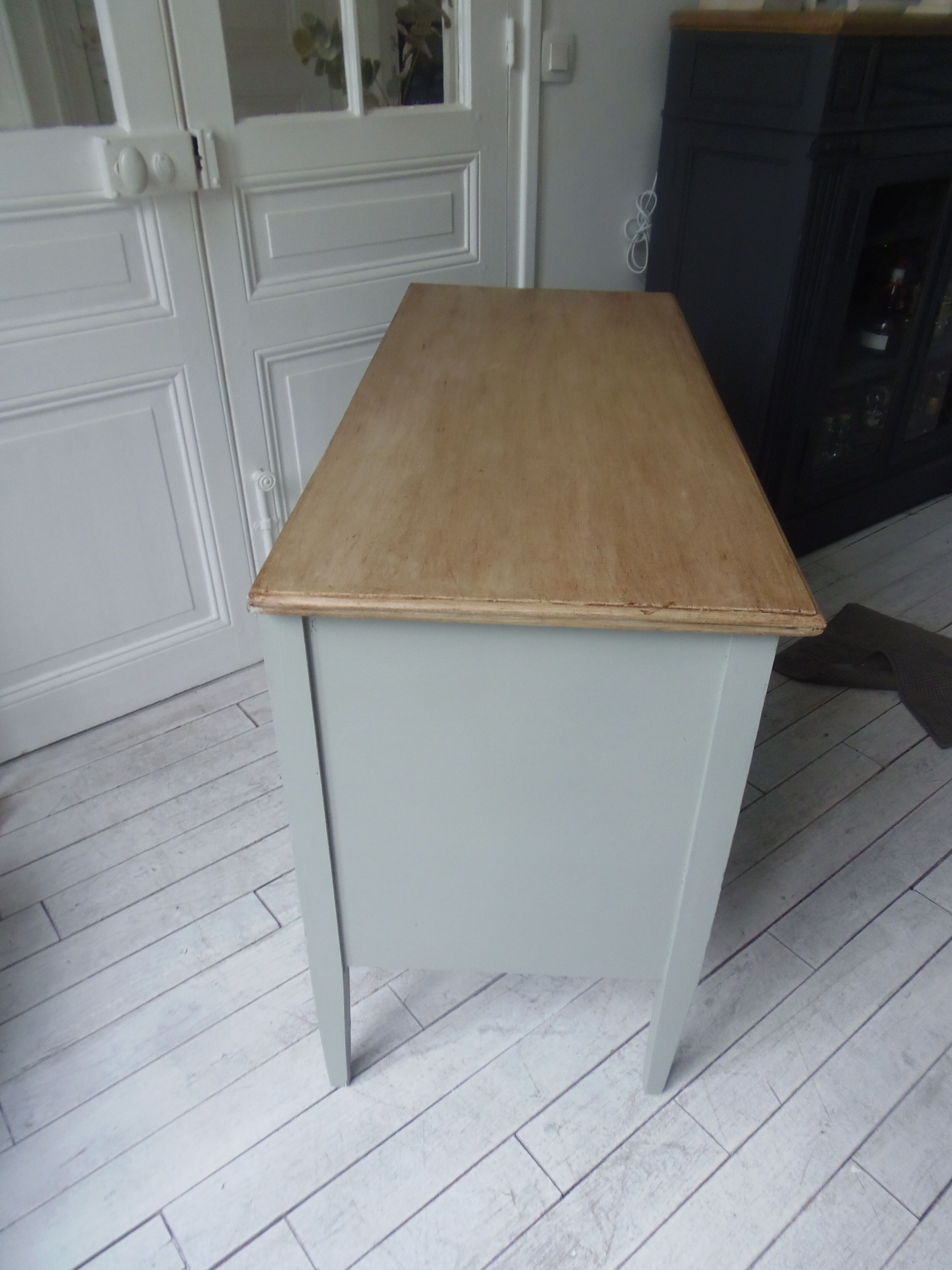 Green green vintage chest of drawers of gray, wood top.