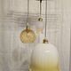 Suspension triple opaline with engraved and frosted glass in shades of yellow-orange.