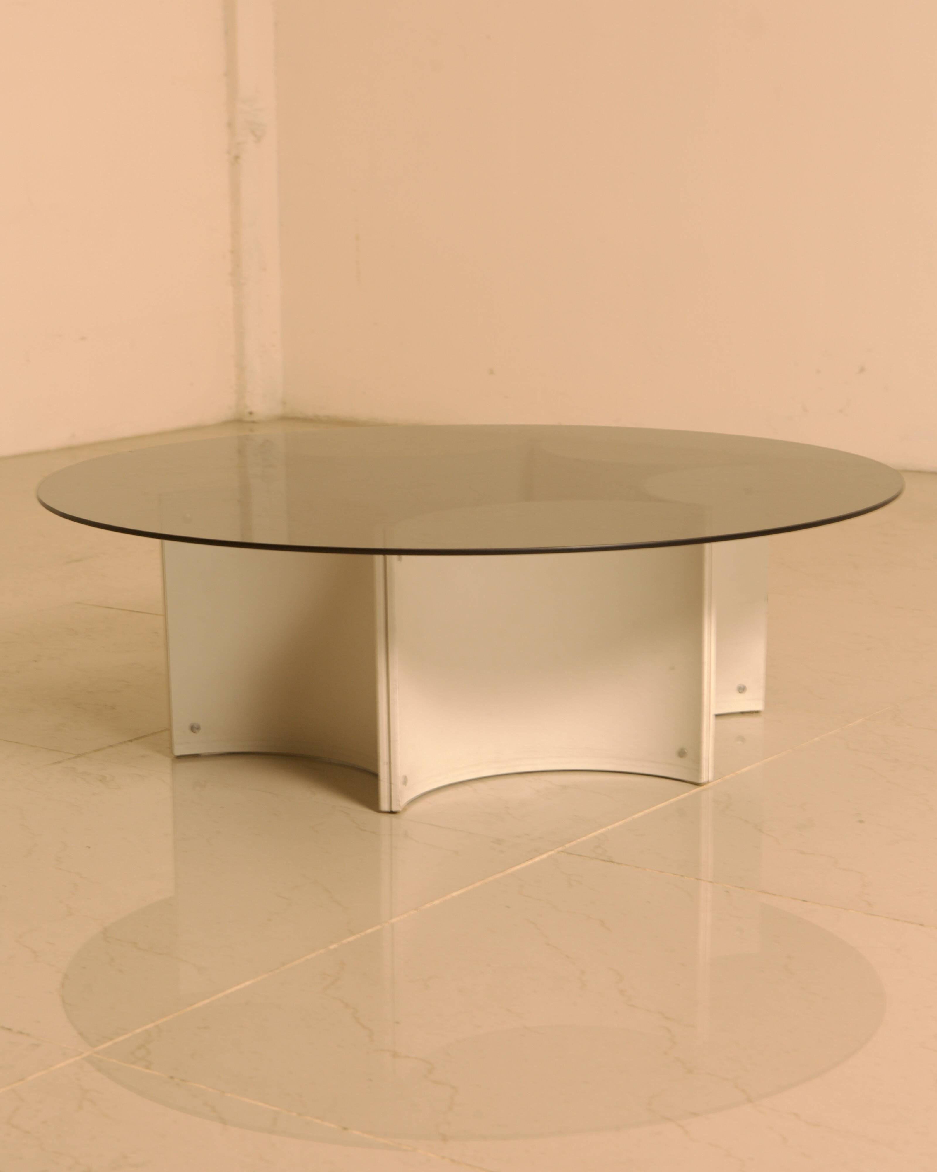 "Space Age" coffee table with star base and smoked glass top from the 70s.