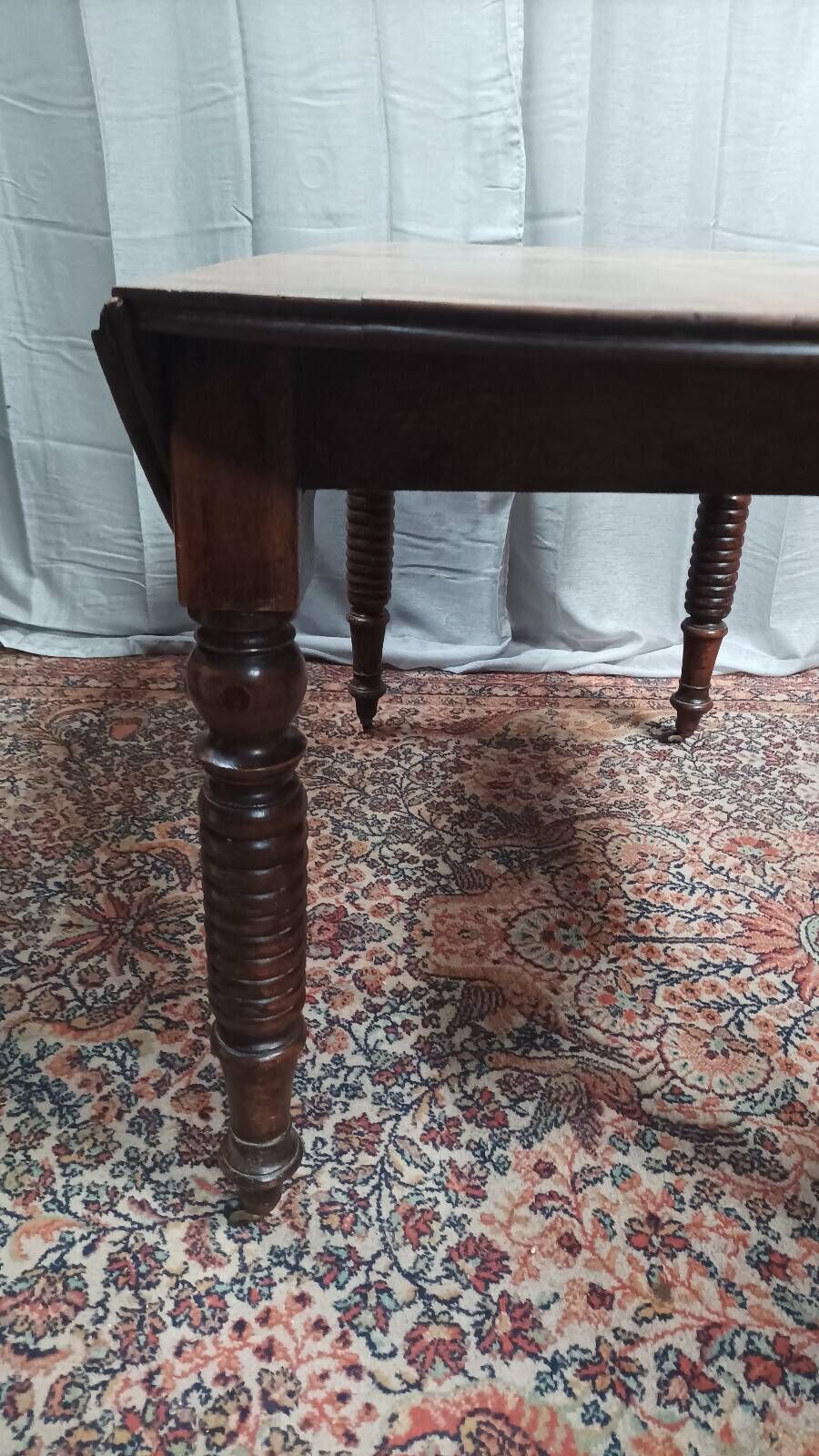 19th-century Louis Philippe walnut drop-leaf table.