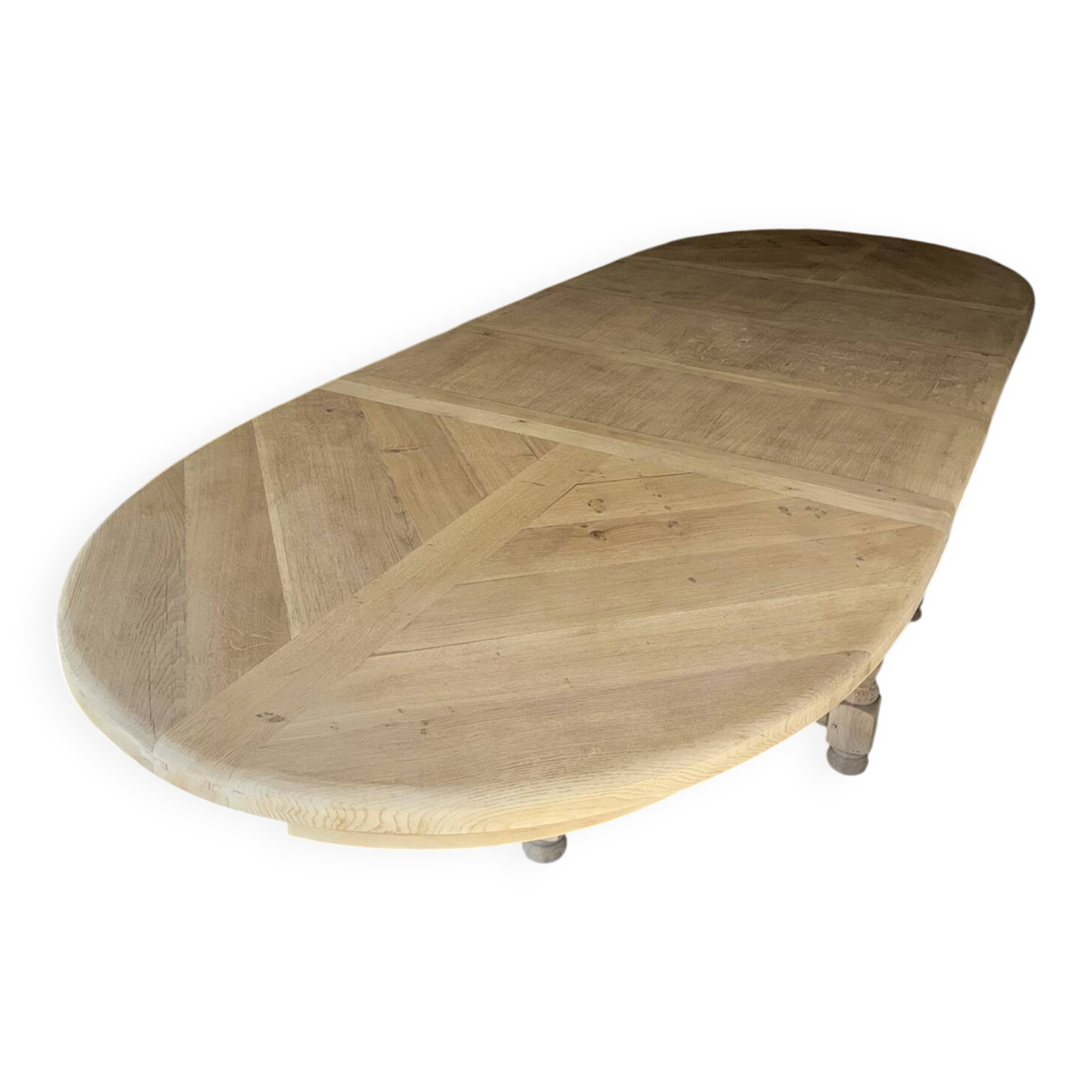 Solid oak farmhouse table with extensions.